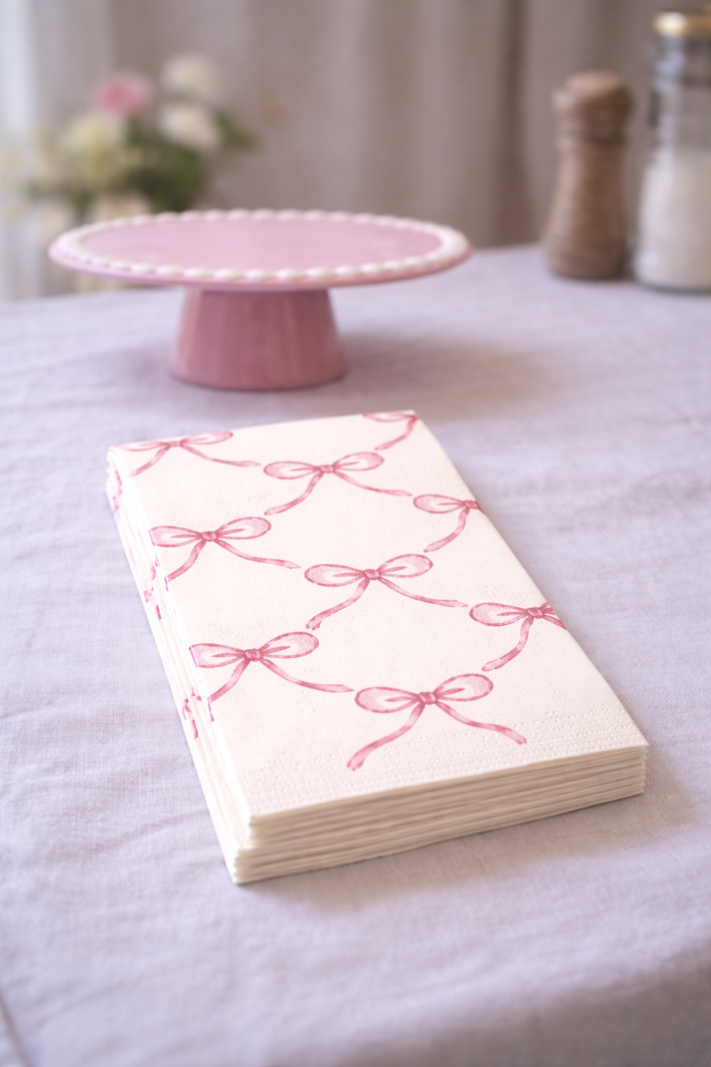 Paper napkin with pink ribbon