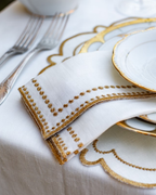 Serviette Weiß mit besticktem Rand Gold, 2er-Set
